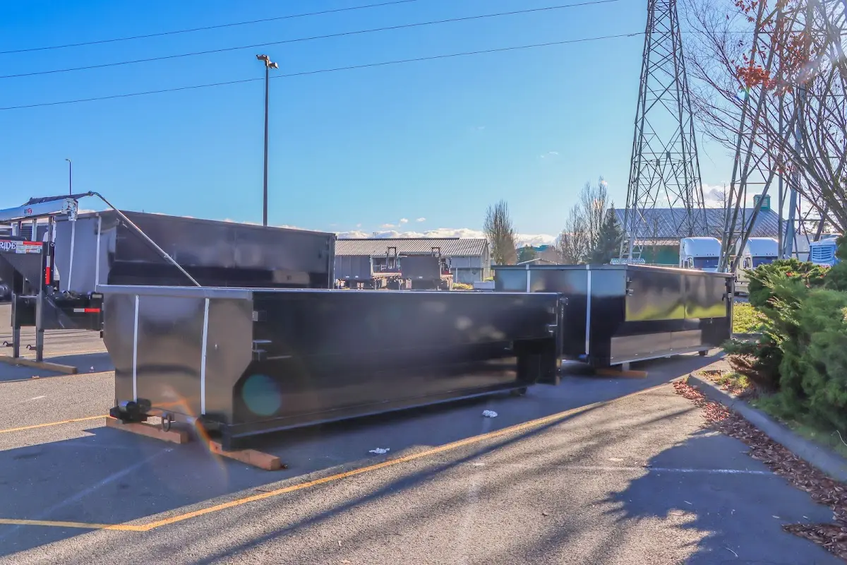 Roll-off dumpster ready for waste disposal at job site for Construction Dumpster Rental in Clinton